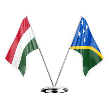 Two table flags isolated on white background 3d illustration, hungary and solomon islands