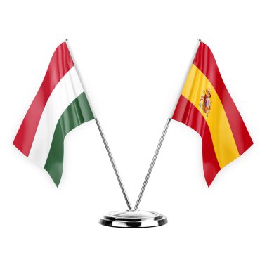 Two table flags isolated on white background 3d illustration, hungary and spain