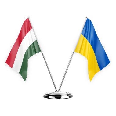 Two table flags isolated on white background 3d illustration, hungary and ukraine