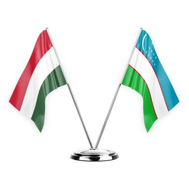 Two table flags isolated on white background 3d illustration, hungary and uzbekistan