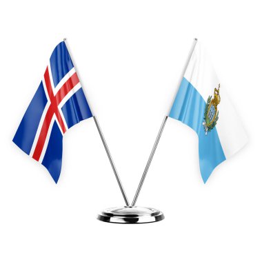 Two table flags isolated on white background 3d illustration, iceland and san marino