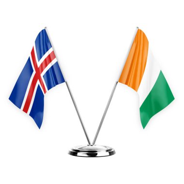 Two table flags isolated on white background 3d illustration, iceland and ivory coast