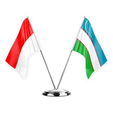 Two table flags isolated on white background 3d illustration, indonesia and uzbekistan