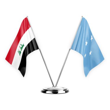 Beyaz arka planda izole edilmiş iki masa bayrağı. 3 boyutlu illüstrasyon, Irak ve mikronezya.