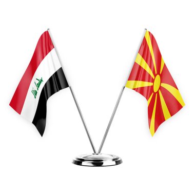 Beyaz arka planda izole edilmiş iki masa bayrağı. 3 boyutlu illüstrasyon, Irak ve Kuzey Massachusetts.