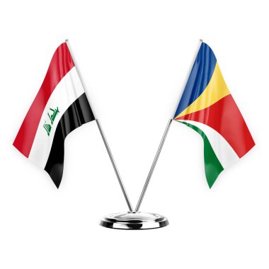 Beyaz arka planda izole edilmiş iki masa bayrağı. 3 boyutlu illüstrasyon, Irak ve Seyşeller.