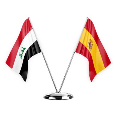 Beyaz arka planda izole edilmiş iki masa bayrağı. 3 boyutlu illüstrasyon, Irak ve İspanya.