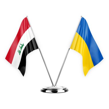 Beyaz arka planda izole edilmiş iki masa bayrağı. 3 boyutlu illüstrasyon, Irak ve Ukrayna.