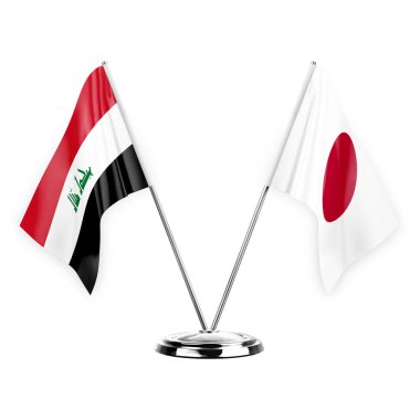 Beyaz arka planda izole edilmiş iki masa bayrağı. 3 boyutlu illüstrasyon, Irak ve Japonya.
