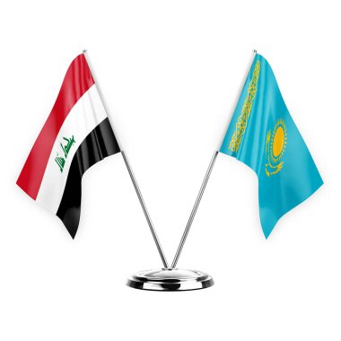 Beyaz arka planda izole edilmiş iki masa bayrağı. 3 boyutlu illüstrasyon, Irak ve Kazakistan.