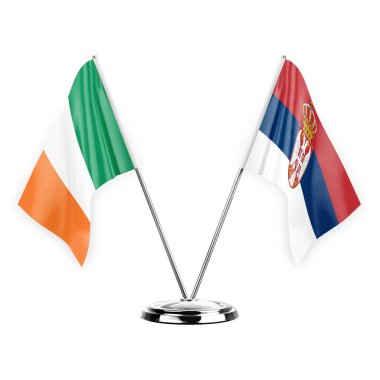 Two table flags isolated on white background 3d illustration, ireland and serbia