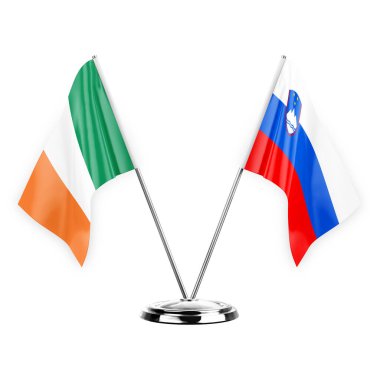 Two table flags isolated on white background 3d illustration, ireland and slovenia