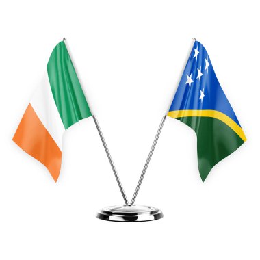 Two table flags isolated on white background 3d illustration, ireland and solomon islands