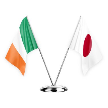 Two table flags isolated on white background 3d illustration, ireland and japan