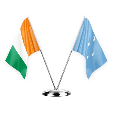 Two table flags isolated on white background 3d illustration, ivory coast and micronesia