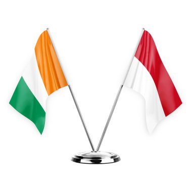 Two table flags isolated on white background 3d illustration, ivory coast and monaco