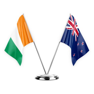 Two table flags isolated on white background 3d illustration, ivory coast and new zealand
