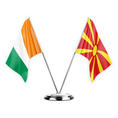 Two table flags isolated on white background 3d illustration, ivory coast and north macedonia