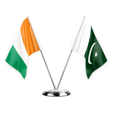 Two table flags isolated on white background 3d illustration, ivory coast and pakistan