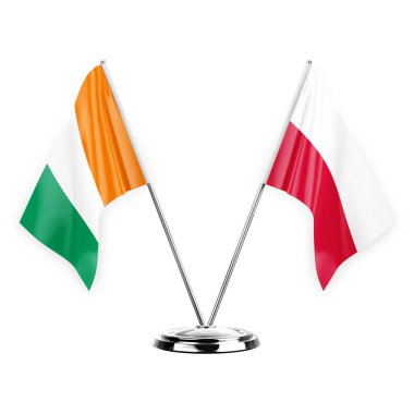 Two table flags isolated on white background 3d illustration, ivory coast and poland