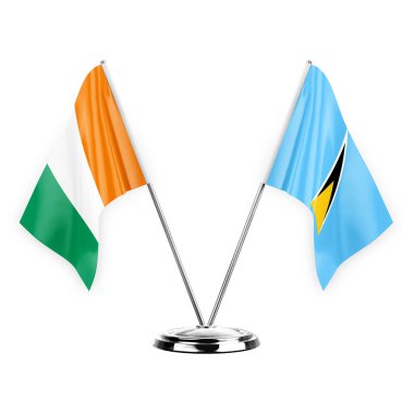 Two table flags isolated on white background 3d illustration, ivory coast and saint lucia