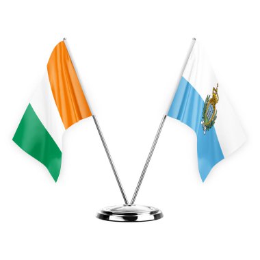 Two table flags isolated on white background 3d illustration, ivory coast and san marino