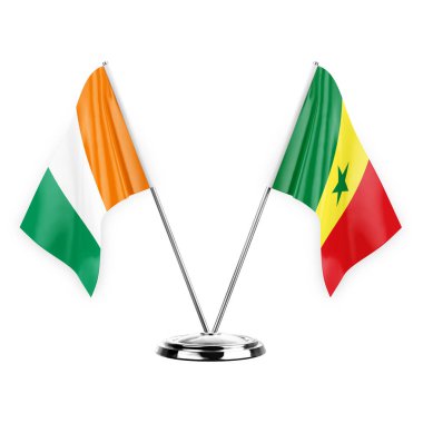 Two table flags isolated on white background 3d illustration, ivory coast and senegal