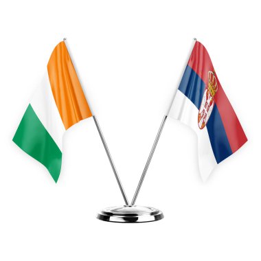 Two table flags isolated on white background 3d illustration, ivory coast and serbia