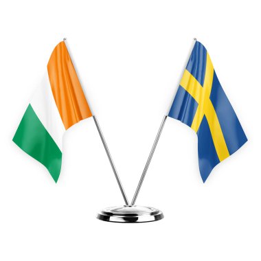 Two table flags isolated on white background 3d illustration, ivory coast and sweden