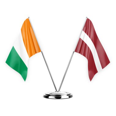 Two table flags isolated on white background 3d illustration, ivory coast and latvia