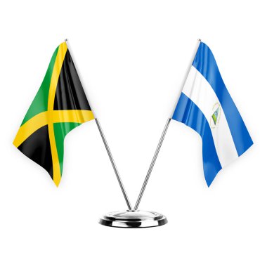 Two table flags isolated on white background 3d illustration, jamaica and nicaragua