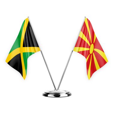 Two table flags isolated on white background 3d illustration, jamaica and north macedonia
