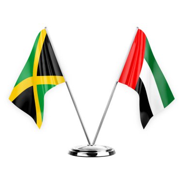 Two table flags isolated on white background 3d illustration, jamaica and united arab emirates