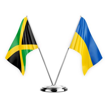 Two table flags isolated on white background 3d illustration, jamaica and ukraine