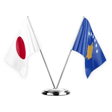 Two table flags isolated on white background 3d illustration, japan and kosovo