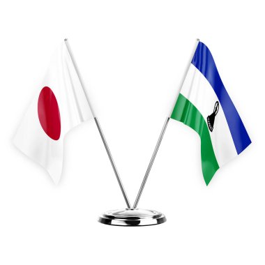 Two table flags isolated on white background 3d illustration, japan and lesotho