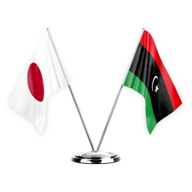 Two table flags isolated on white background 3d illustration, japan and libya