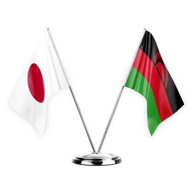 Two table flags isolated on white background 3d illustration, japan and malawi