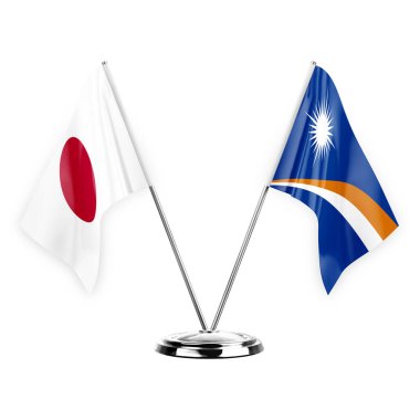 Two table flags isolated on white background 3d illustration, japan and marshall islands