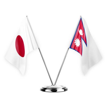 Two table flags isolated on white background 3d illustration, japan and nepal