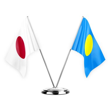 Two table flags isolated on white background 3d illustration, japan and palau