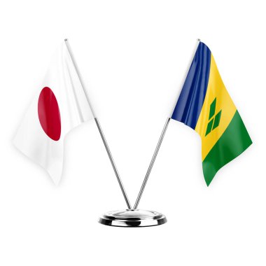 Two table flags isolated on white background 3d illustration, japan and saint vincent and the grenadines