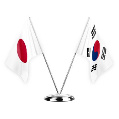 Two table flags isolated on white background 3d illustration, japan and south korea