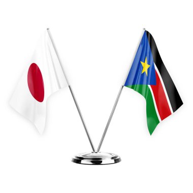 Two table flags isolated on white background 3d illustration, japan and south sudan
