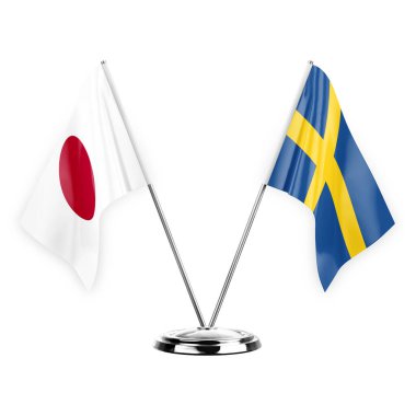 Two table flags isolated on white background 3d illustration, japan and sweden