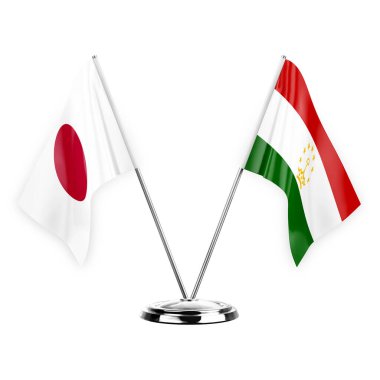 Two table flags isolated on white background 3d illustration, japan and tajikistan