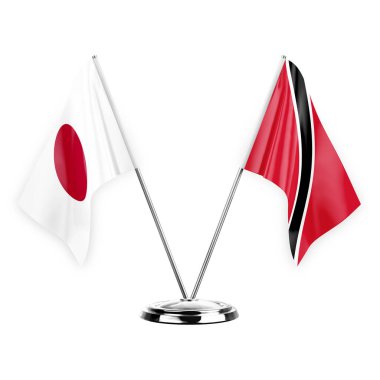 Two table flags isolated on white background 3d illustration, japan and tobago