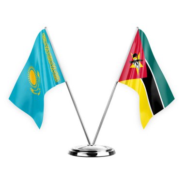 Two table flags isolated on white background 3d illustration, kazakhstan and mozambique
