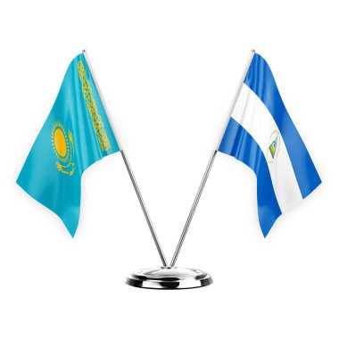 Two table flags isolated on white background 3d illustration, kazakhstan and nicaragua