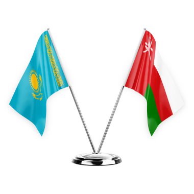 Two table flags isolated on white background 3d illustration, kazakhstan and oman